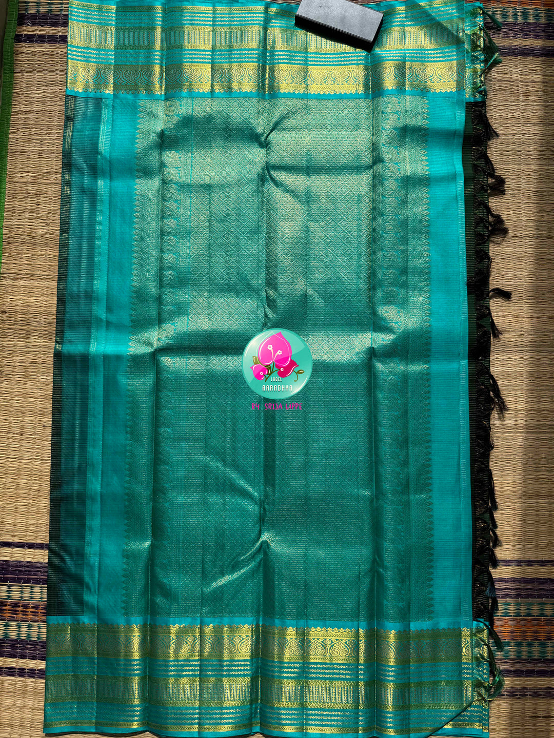 The Midnight Tide: Bottle Green & Light Blue Vaira Oosi Kanchipattu Saree