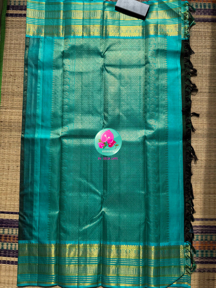 The Midnight Tide: Bottle Green & Light Blue Vaira Oosi Kanchipattu Saree