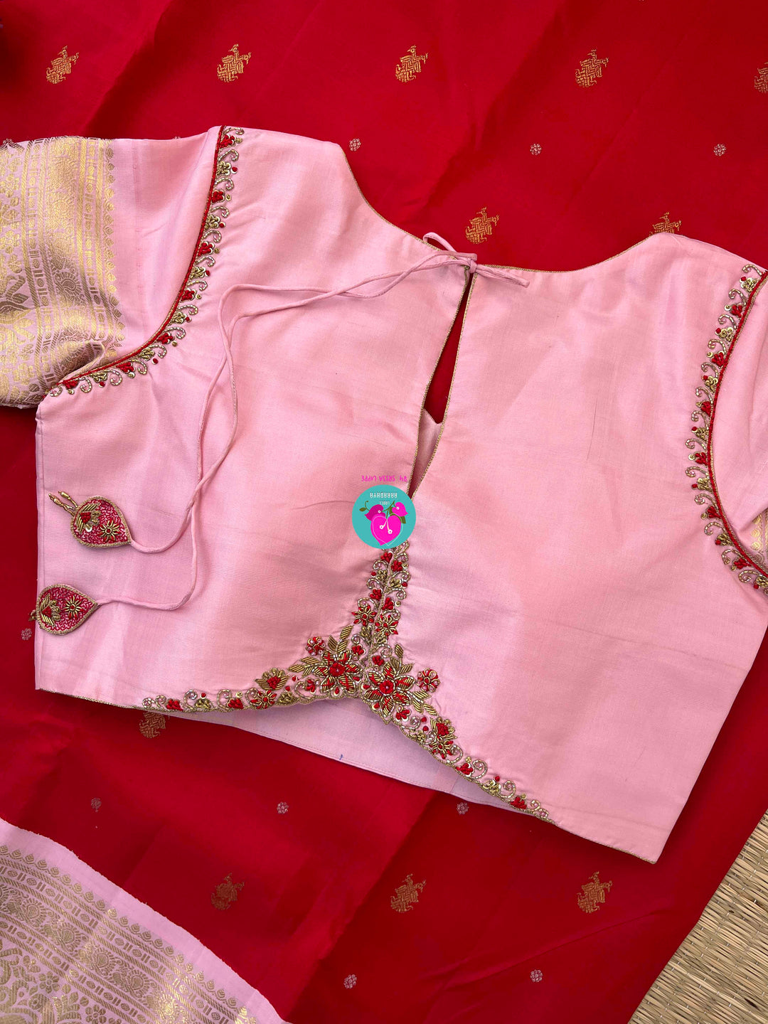 Pure Kanchipattu Red Saree with Hand embroidered Pink blouse