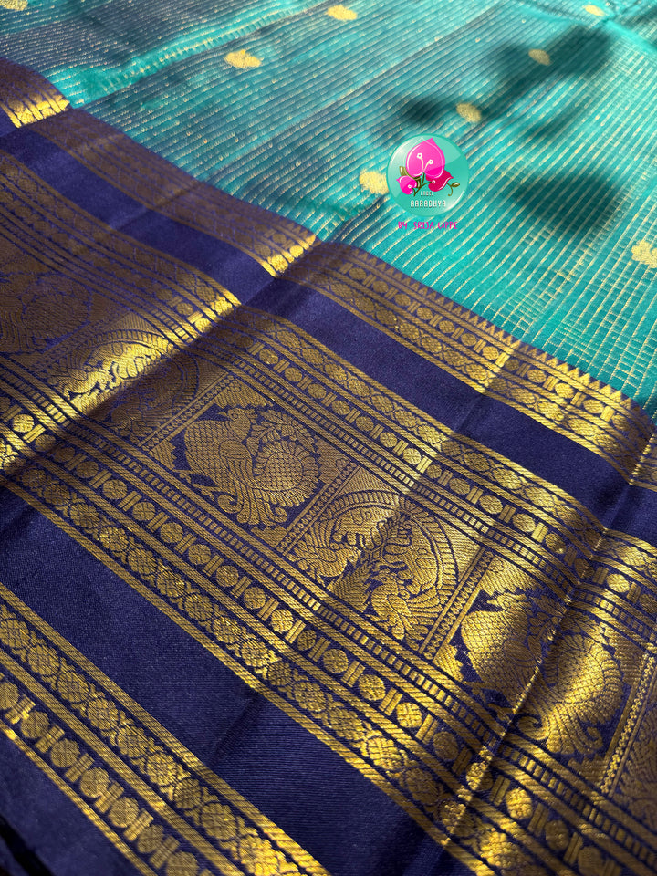 The Teal Needle-Stream: Peacock Green Vaira Oosi Kanchipattu Saree with Hand Embroidered blouse