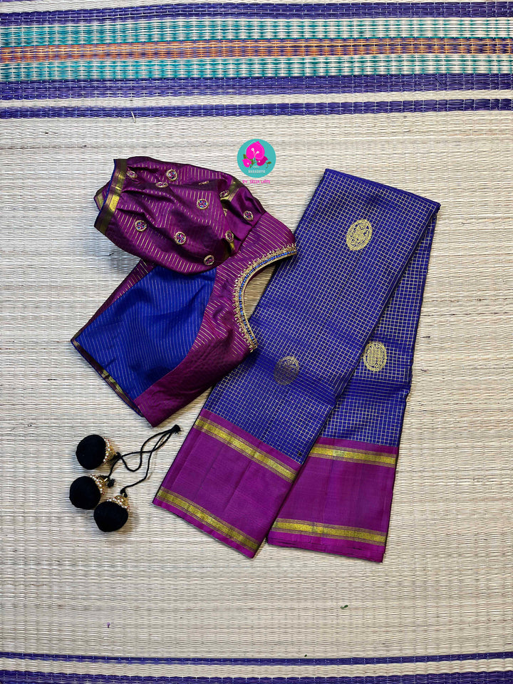Pure Kanchipattu handloom Saree in classic royal blue paired with Hand embroidered blouse