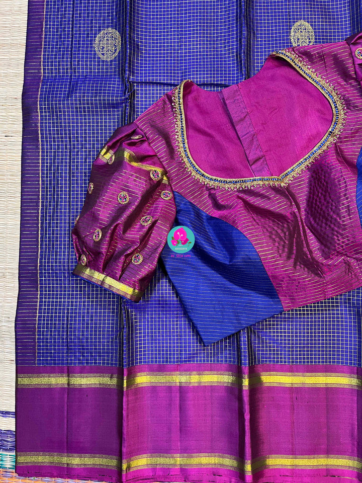 Pure Kanchipattu handloom Saree in classic royal blue paired with Hand embroidered blouse
