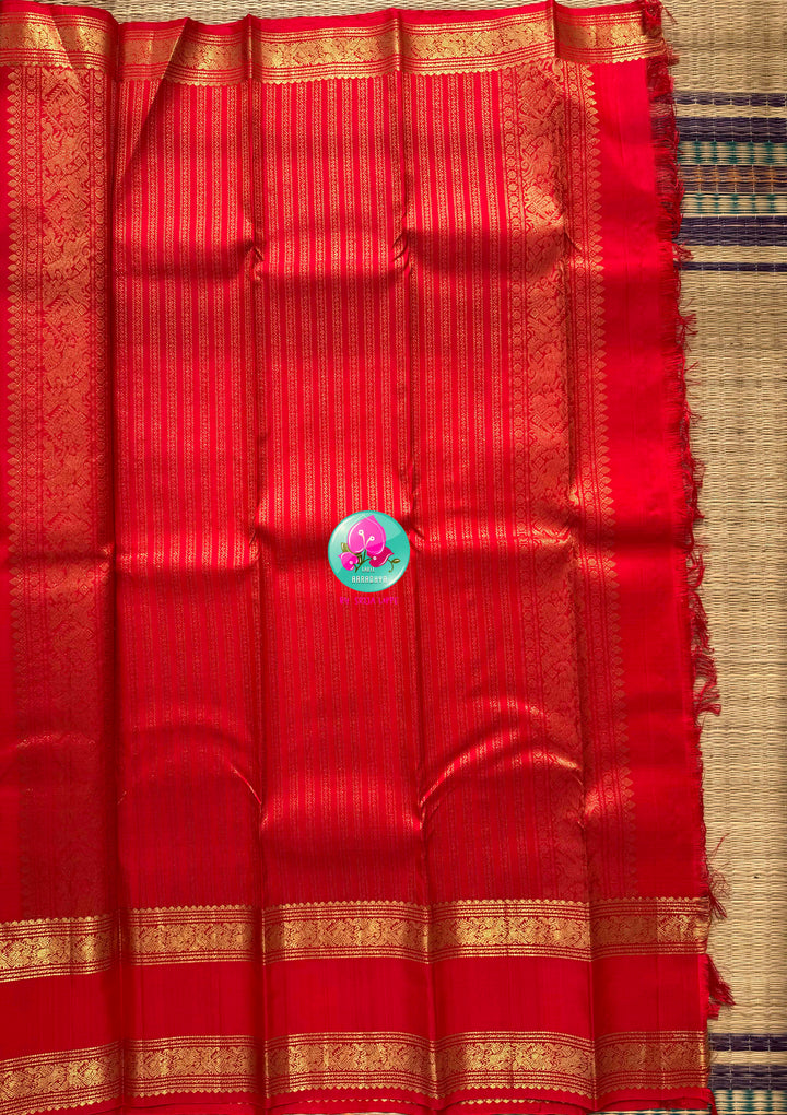 Royal Vermilion: Bright Red Kanchipattu Gap Border Saree & Imperial Peacock Blouse