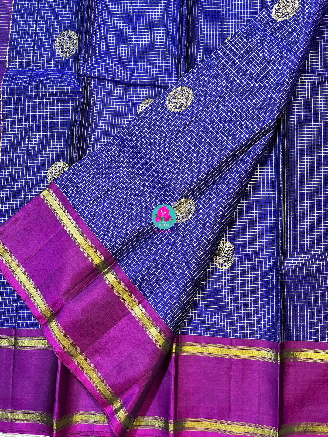 Pure Kanchipattu handloom Saree in classic royal blue paired with Hand embroidered blouse