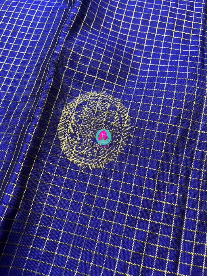 Pure Kanchipattu handloom Saree in classic royal blue paired with Hand embroidered blouse