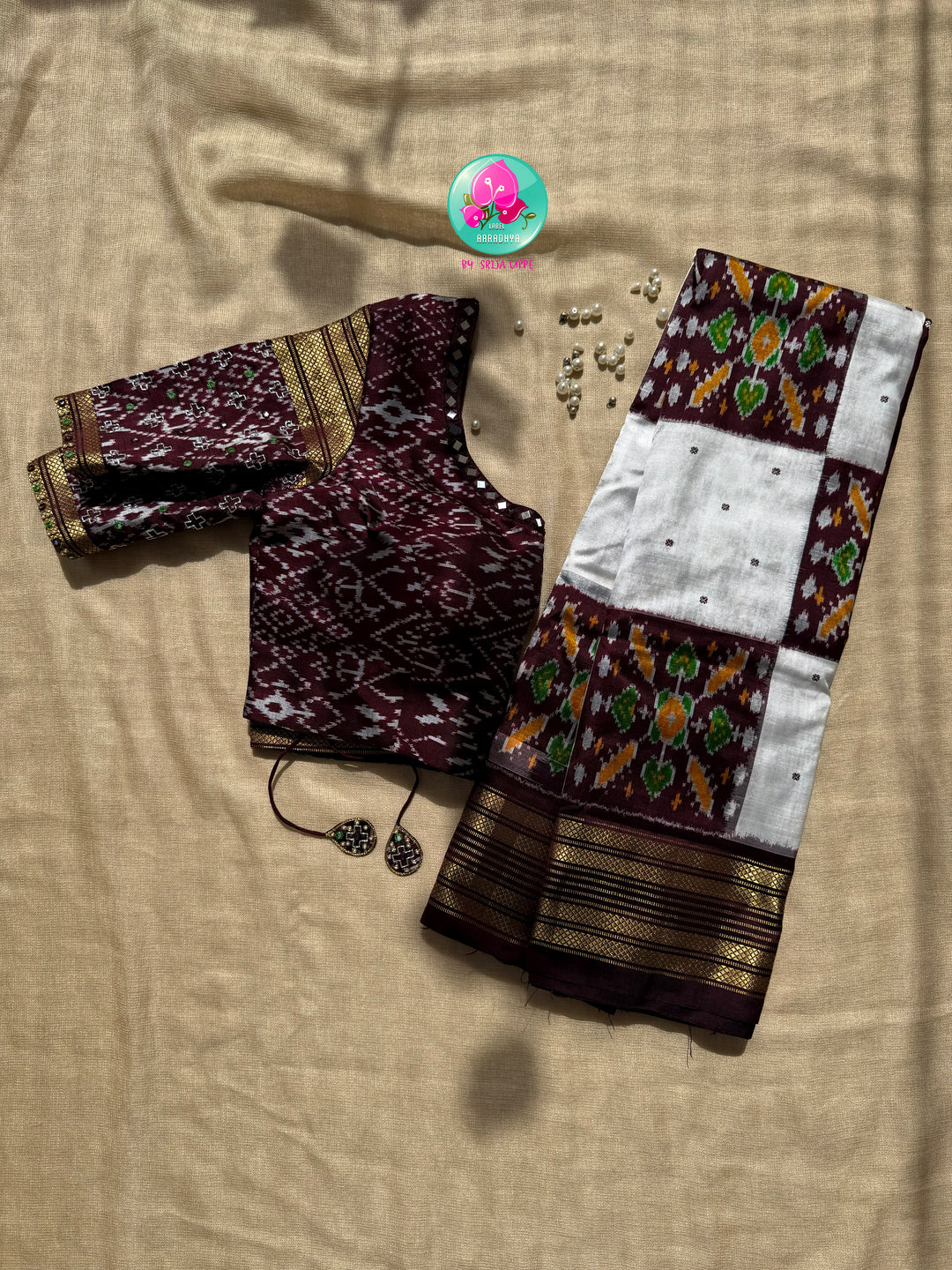 Rhythmic Geometry: The Earthy Brown & Crisp White Pure Silk Ikkat Masterpiece