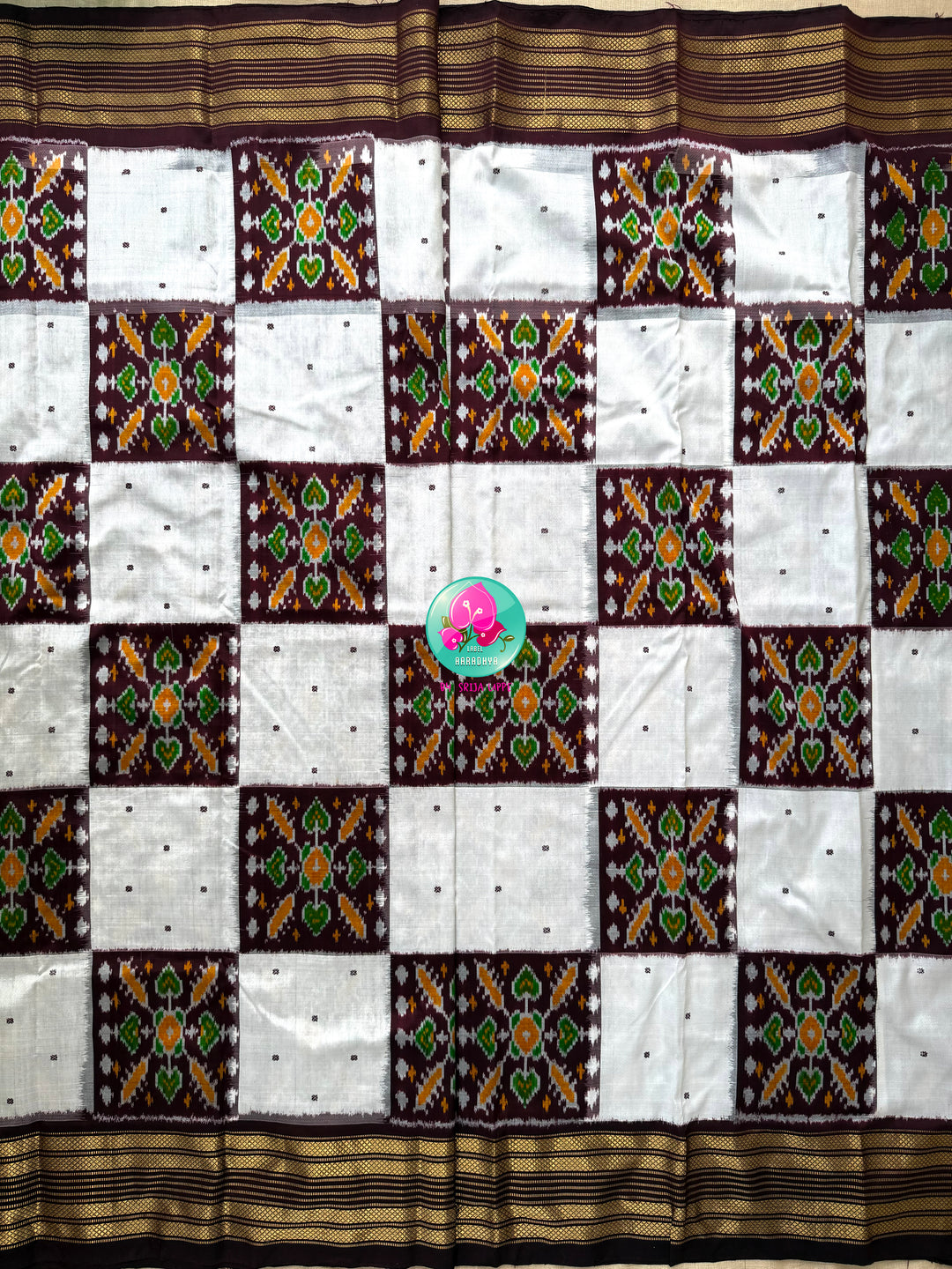 Rhythmic Geometry: The Earthy Brown & Crisp White Pure Silk Ikkat Masterpiece