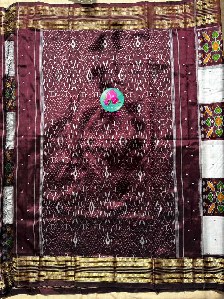 Rhythmic Geometry: The Earthy Brown & Crisp White Pure Silk Ikkat Masterpiece