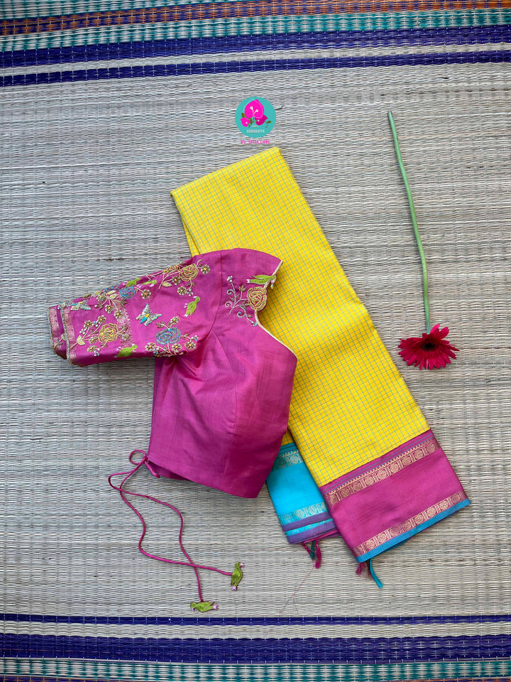 Pure zari Kanchipattu saree in Madras checks and Ganga Jamuna border paired with Hand Embroidered blouse