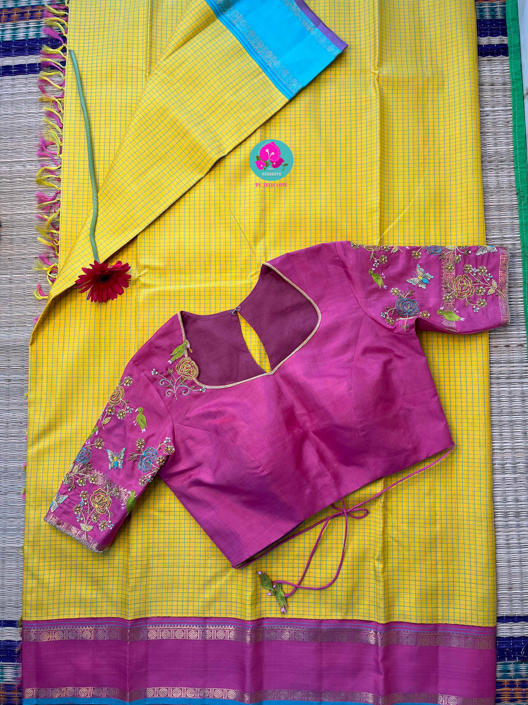 Pure zari Kanchipattu saree in Madras checks and Ganga Jamuna border paired with Hand Embroidered blouse