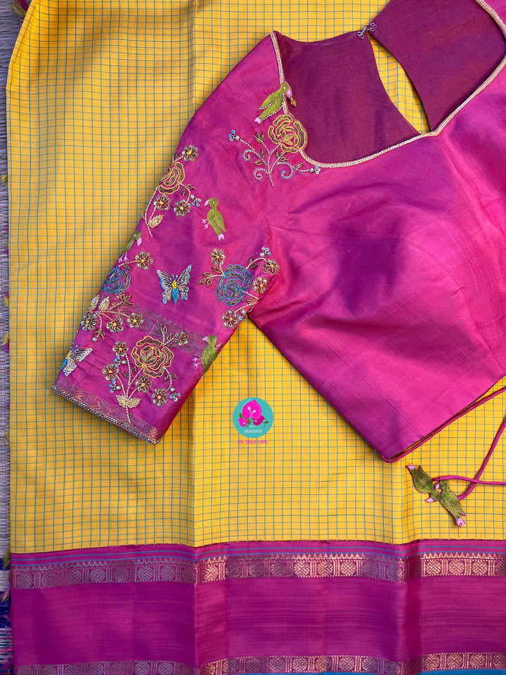 Pure zari Kanchipattu saree in Madras checks and Ganga Jamuna border paired with Hand Embroidered blouse