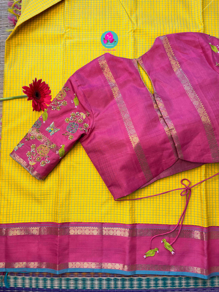 Pure zari Kanchipattu saree in Madras checks and Ganga Jamuna border paired with Hand Embroidered blouse