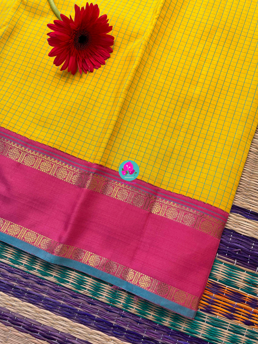 Pure zari Kanchipattu saree in Madras checks and Ganga Jamuna border paired with Hand Embroidered blouse