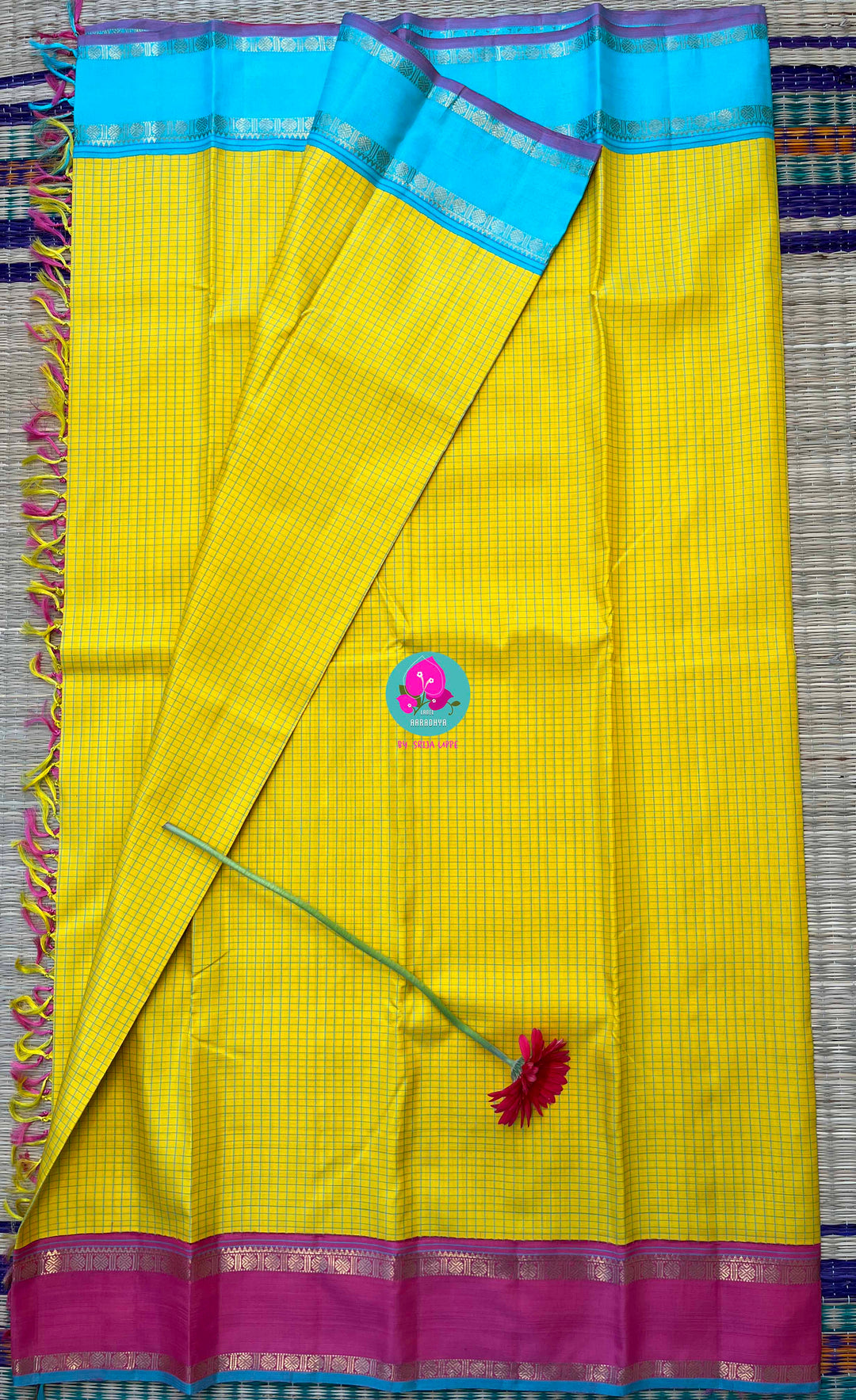 Pure zari Kanchipattu saree in Madras checks and Ganga Jamuna border paired with Hand Embroidered blouse