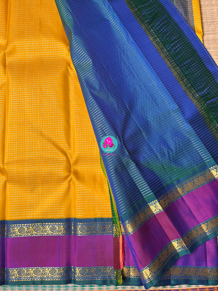 Kanchipuram saree in yellow Vaira Oosi Check, with fine 2g Zari