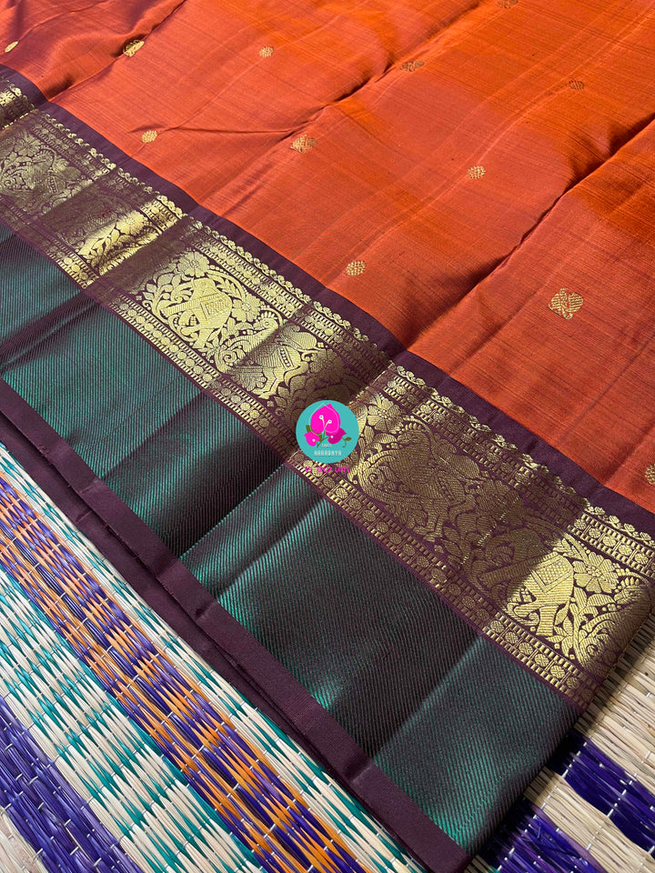 2g Zari Kanchipattu saree in rich brown and bottle green