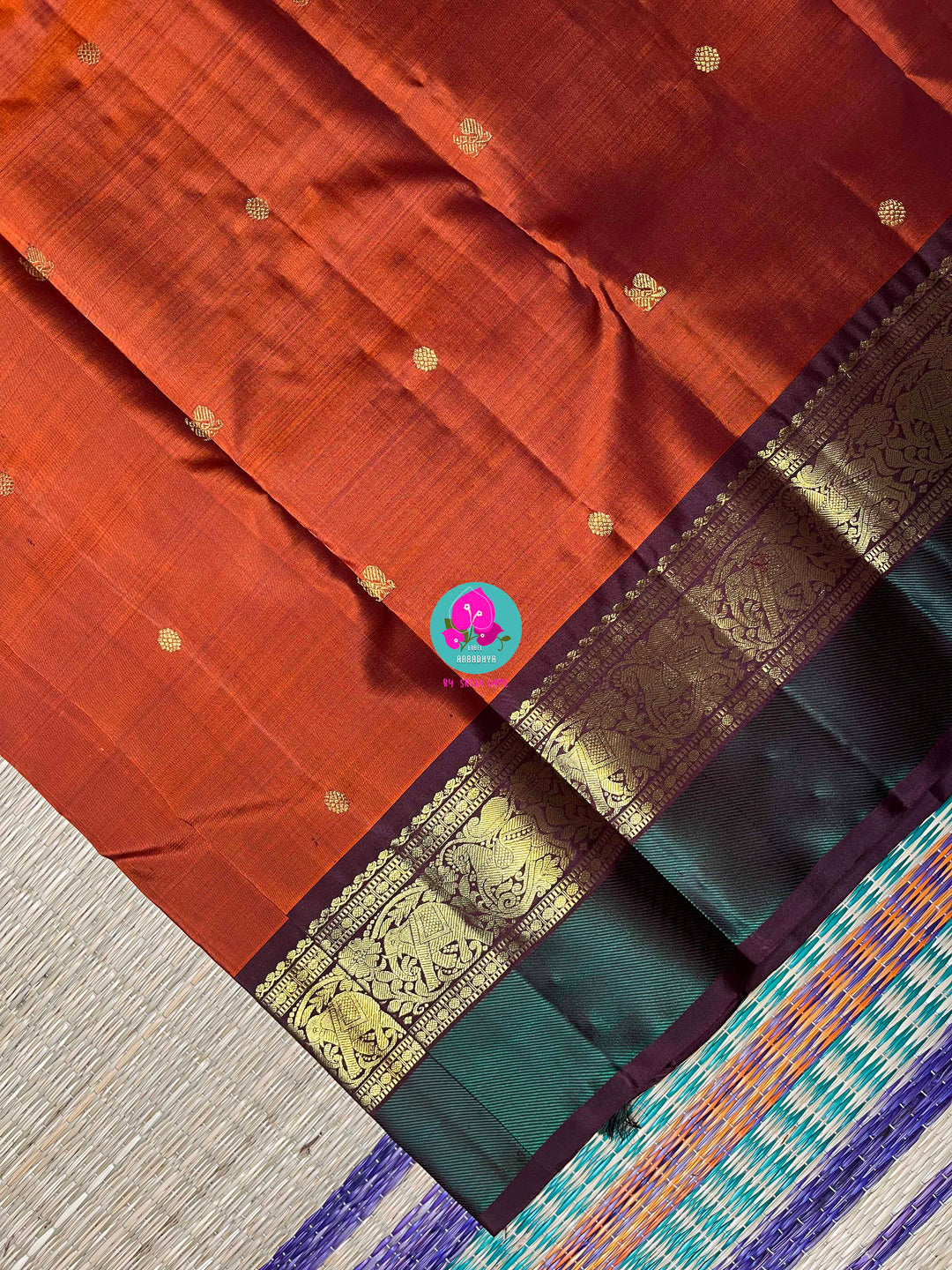 2g Zari Kanchipattu saree in rich brown and bottle green