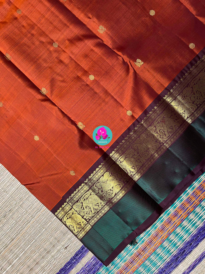 2g Zari Kanchipattu saree in rich brown and bottle green