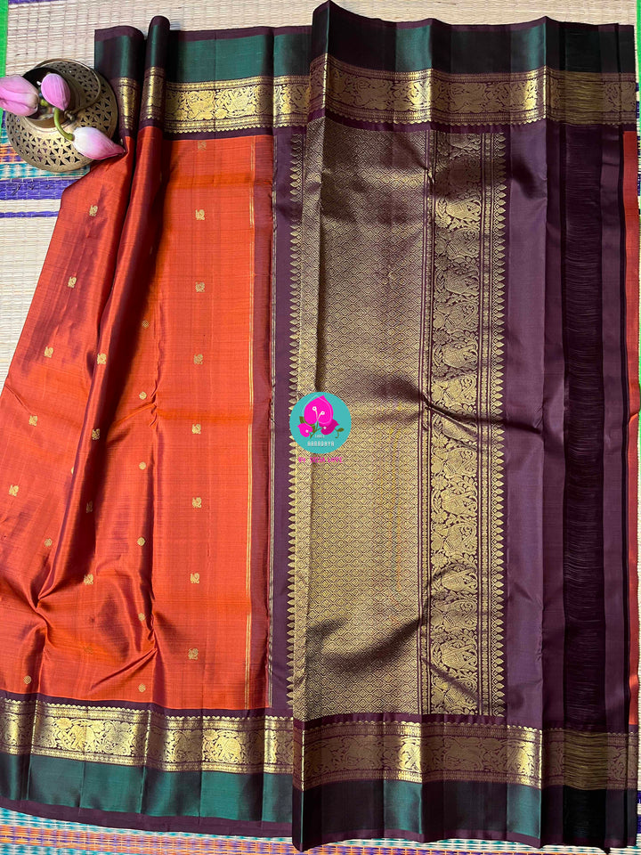 2g Zari Kanchipattu saree in rich brown and bottle green
