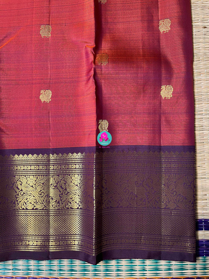 2g Zari Kanchipattu saree in rustic red maroon and dark purple.
