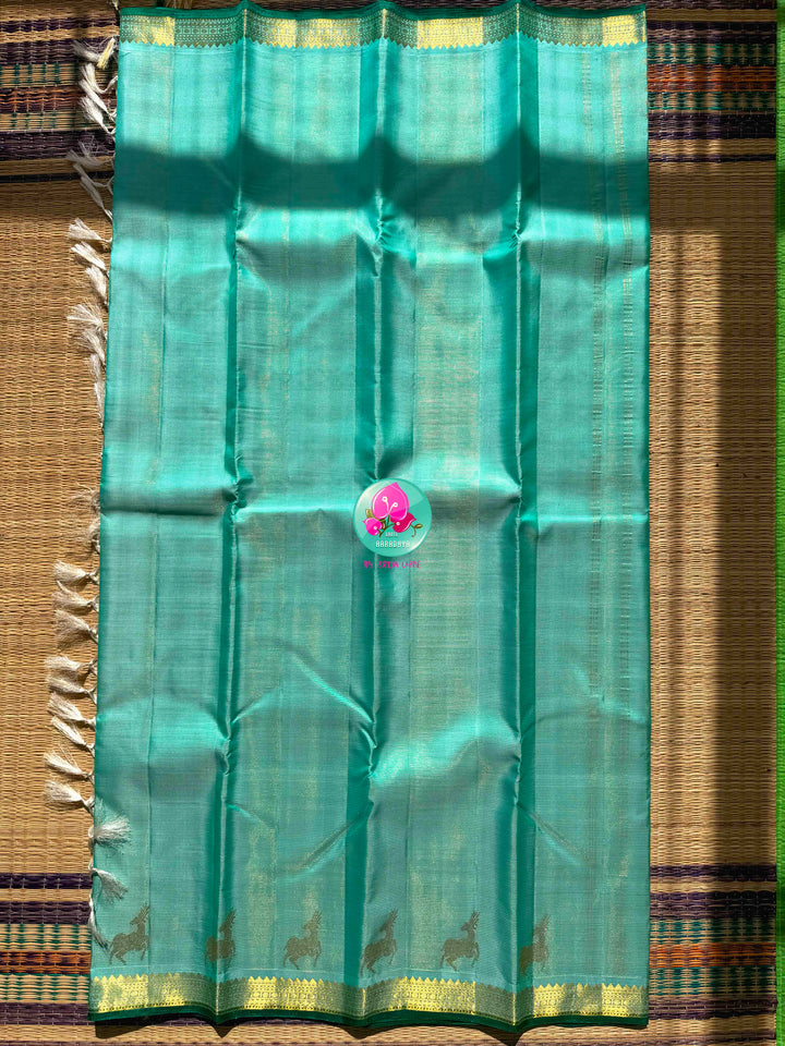 The Cerulean Forest: Light Blue & Emerald Green Handloom Kanchipattu