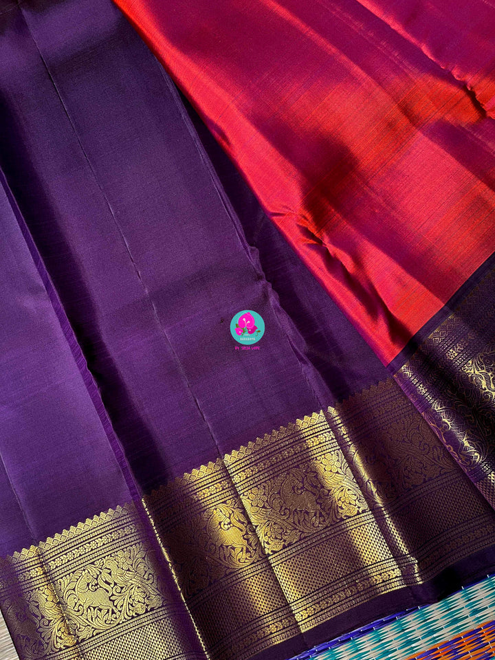 2g Zari Kanchipattu saree in rustic red maroon and dark purple.