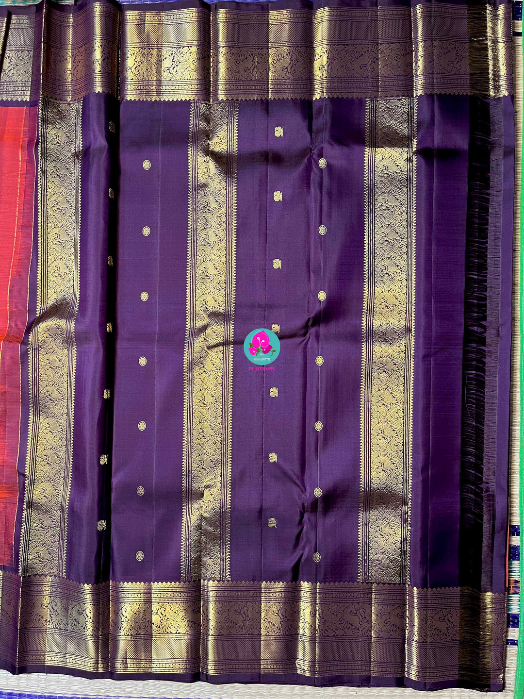 2g Zari Kanchipattu saree in rustic red maroon and dark purple.