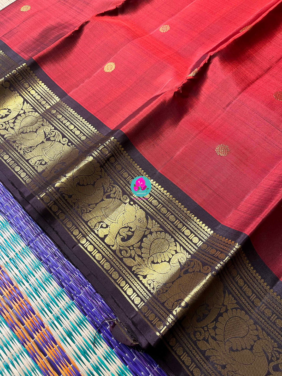 2g Zari Kanchipattu saree in rustic maroon pink and deep brown.