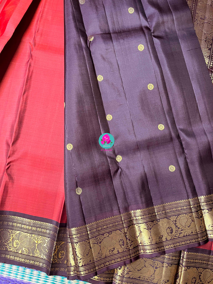 2g Zari Kanchipattu saree in rustic maroon pink and deep brown.