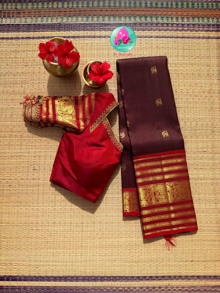 Crimson Hibiscus on Earth: The Vintage Brown Vaira Oosi Kanchipattu