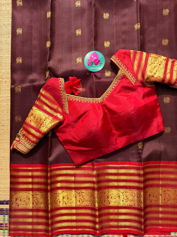Crimson Hibiscus on Earth: The Vintage Brown Vaira Oosi Kanchipattu