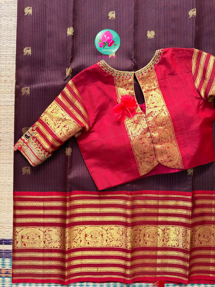Crimson Hibiscus on Earth: The Vintage Brown Vaira Oosi Kanchipattu