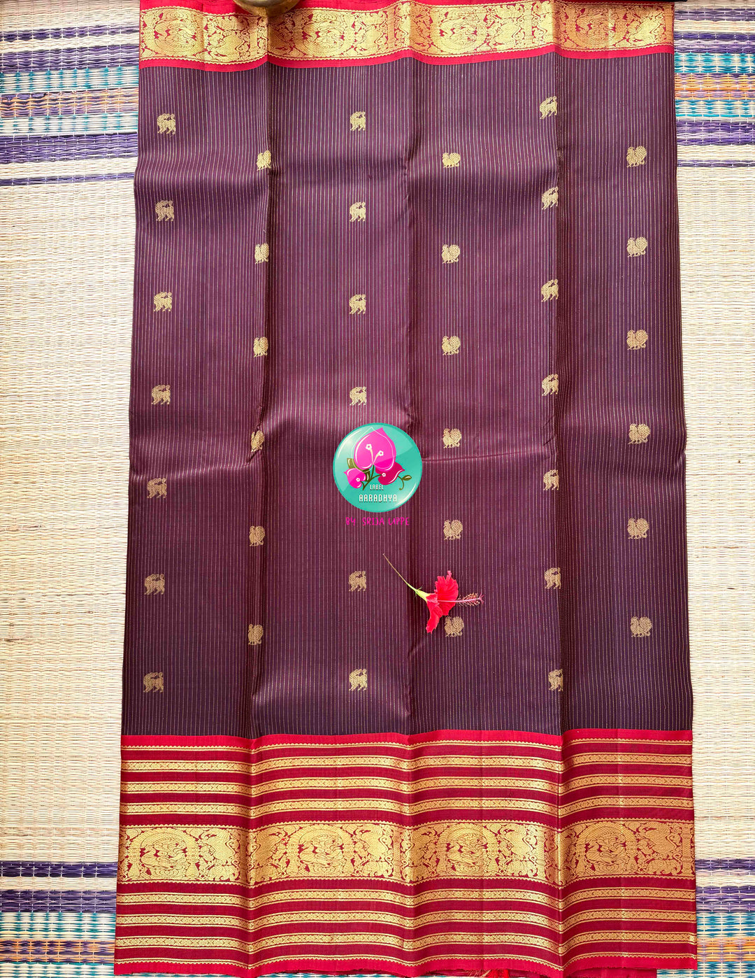 Crimson Hibiscus on Earth: The Vintage Brown Vaira Oosi Kanchipattu