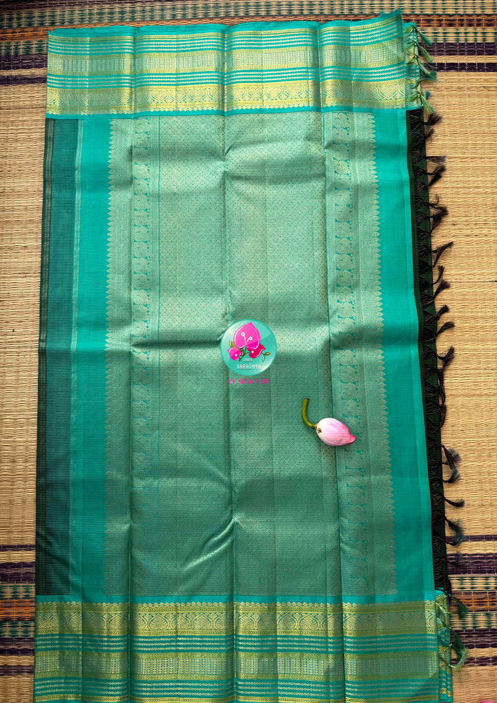 The Verdant Needle-Stream: Bottle Green & Light Blue Vaira Oosi Kanchipattu
