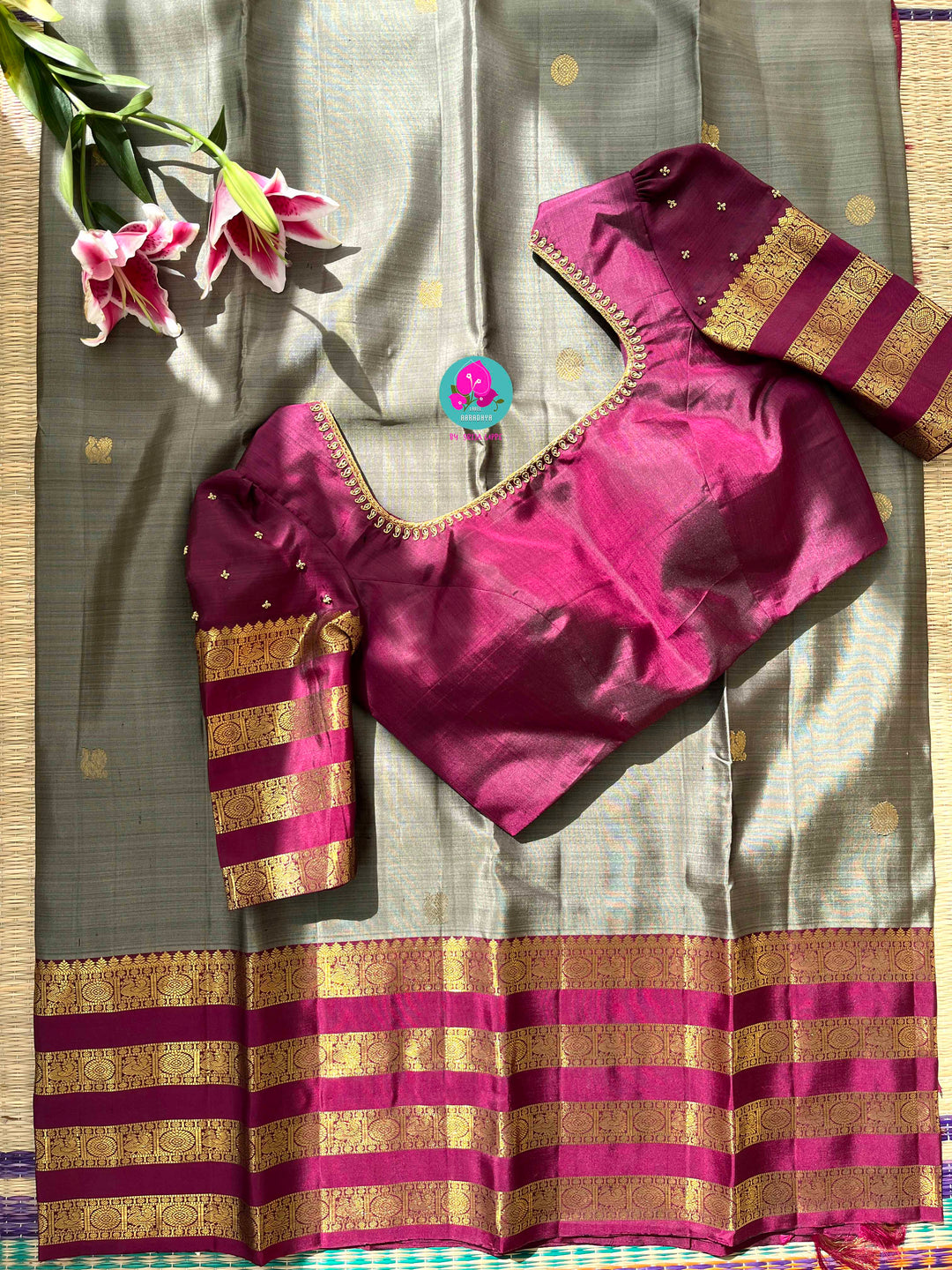 Pure Kanchipattu treasure in Elaichi greenish grey color paired with hand embroidered blouse