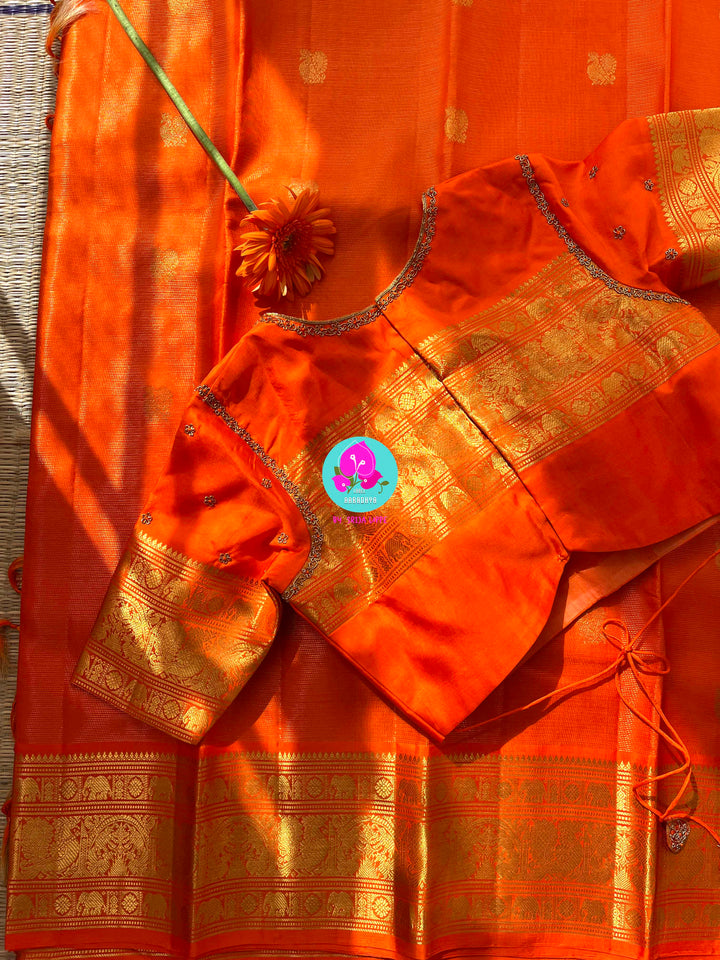 Pure Kanchipattu 3g zari traditional Vaira oosi design Saree on beautiful orange color Paired with blouse
