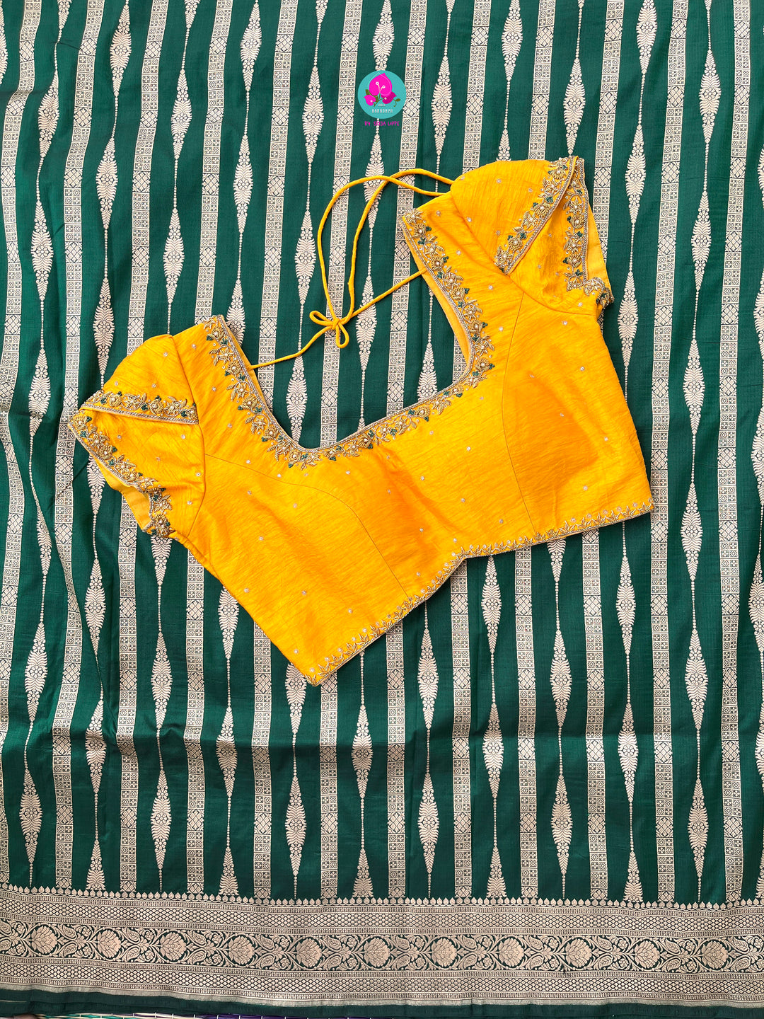 Bottle Green Pure Banarasi Katan Silk Saree Paired with Mustard Orange Blouse