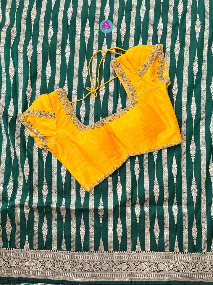 Bottle Green Pure Banarasi Katan Silk Saree Paired with Mustard Orange Blouse