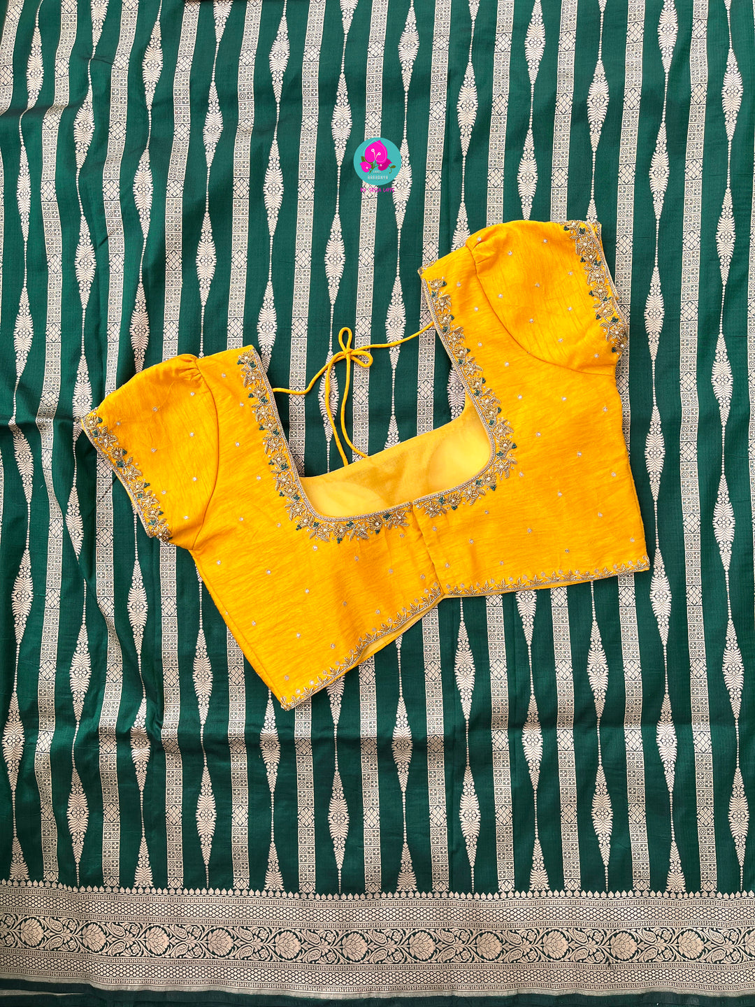 Bottle Green Pure Banarasi Katan Silk Saree Paired with Mustard Orange Blouse