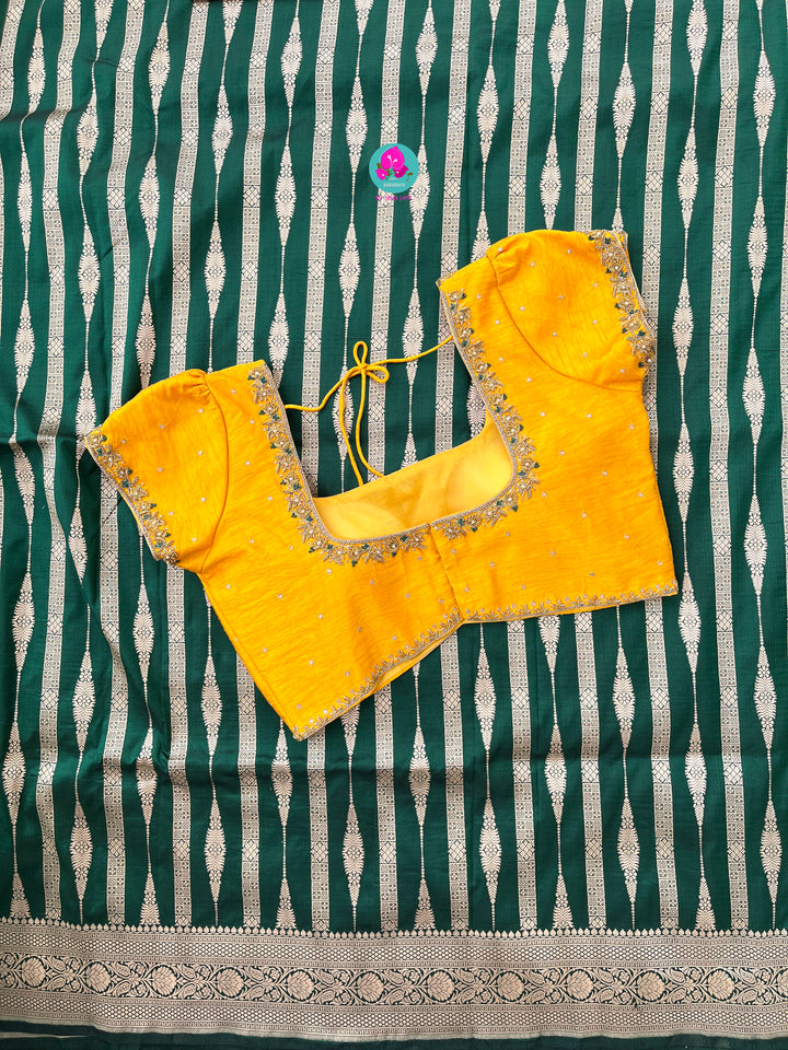 Bottle Green Pure Banarasi Katan Silk Saree Paired with Mustard Orange Blouse