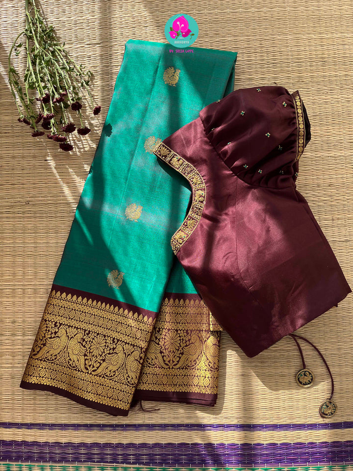 Pure Peacock green Kanchipattu handloom saree with hand embroidered short sleeves blouse