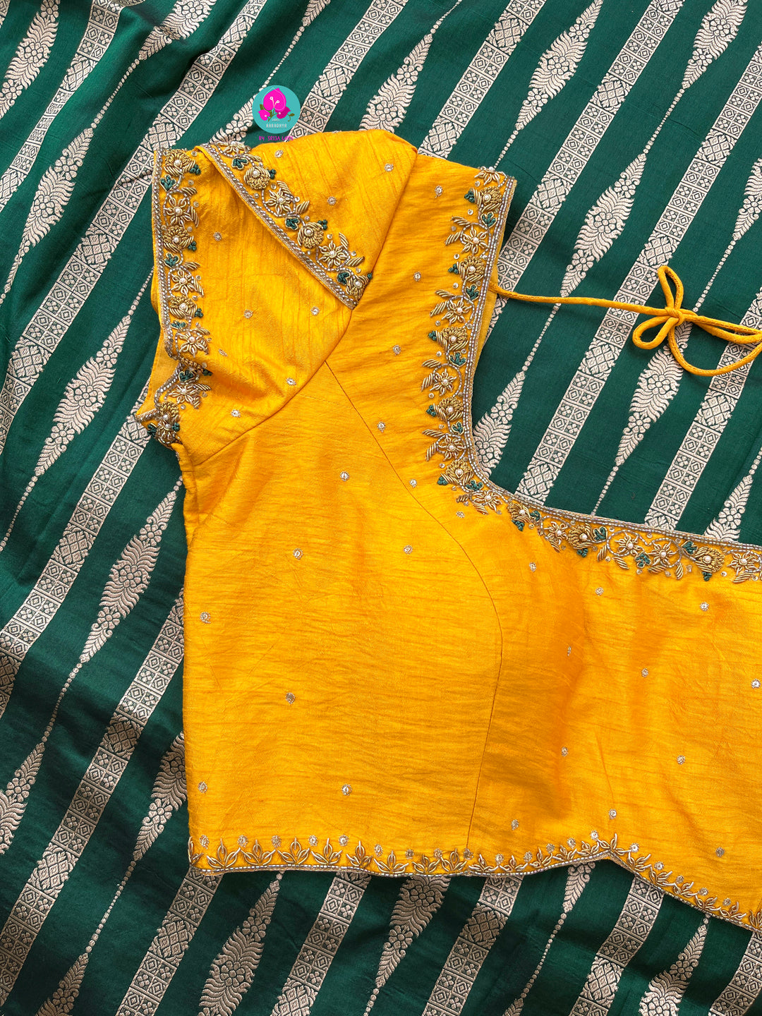 Bottle Green Pure Banarasi Katan Silk Saree Paired with Mustard Orange Blouse