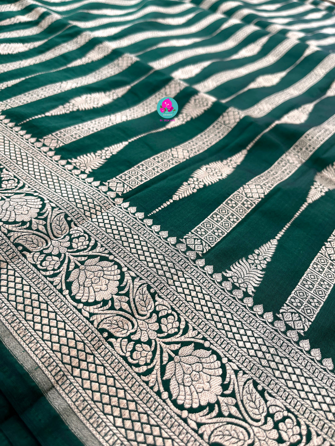 Bottle Green Pure Banarasi Katan Silk Saree Paired with Mustard Orange Blouse