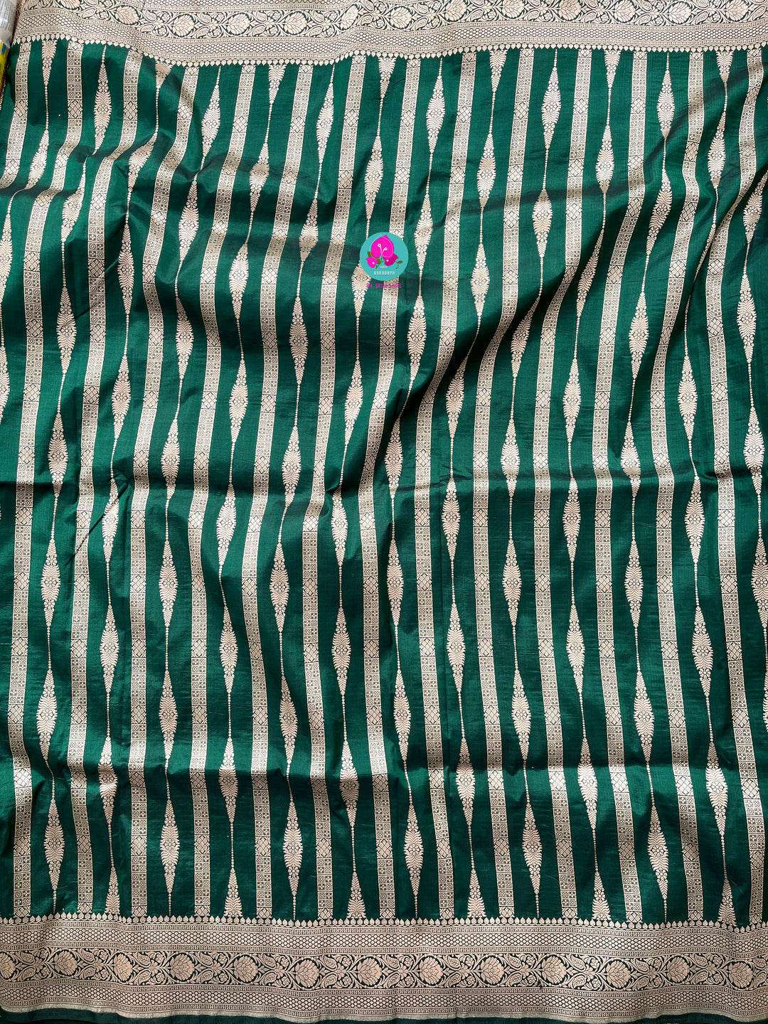 Bottle Green Pure Banarasi Katan Silk Saree Paired with Mustard Orange Blouse