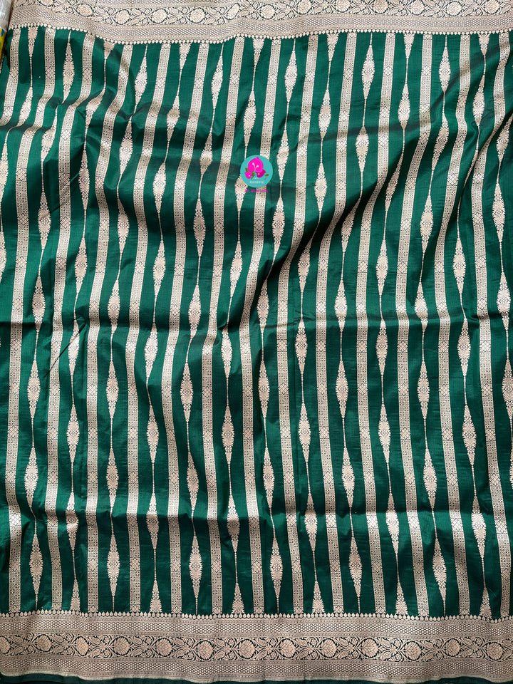 Bottle Green Pure Banarasi Katan Silk Saree Paired with Mustard Orange Blouse