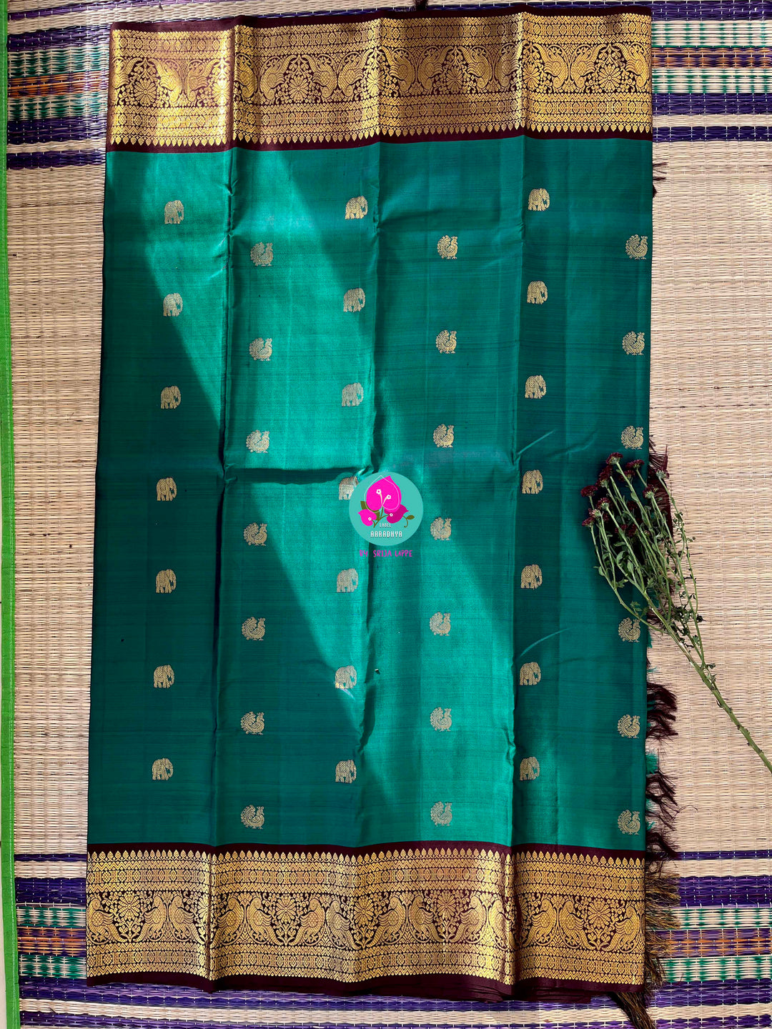Pure Peacock green Kanchipattu handloom saree with hand embroidered long sleeves blouse