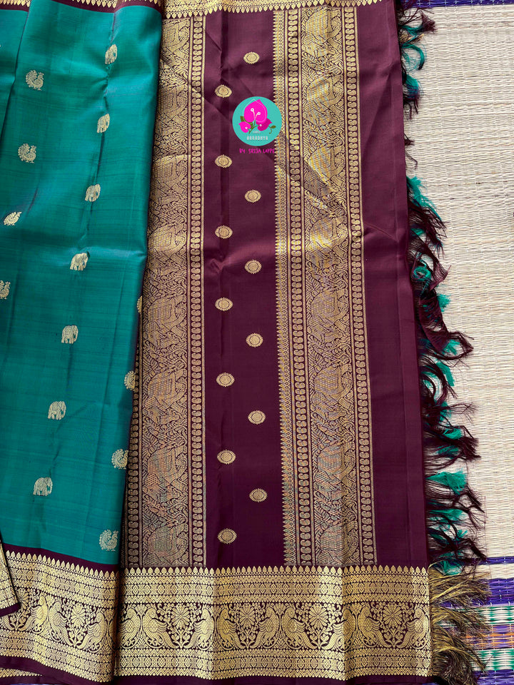 Pure Peacock green Kanchipattu handloom saree with hand embroidered long sleeves blouse
