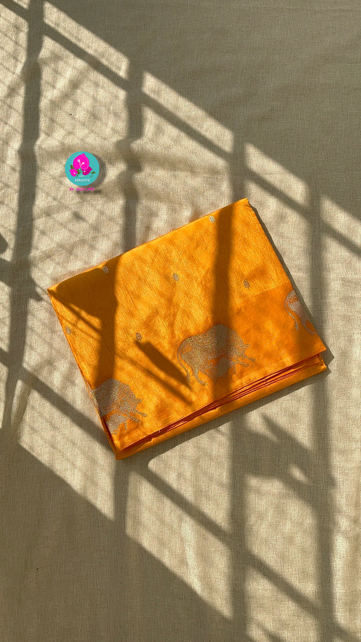 Benarasi semi raw mango silk saree with Khamdhenu weave in Tangerine color