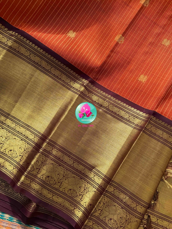 Vintage Earth & Gold: The Rust Orange Vaira Oosi Kanchipuram & Grand Artisan Borders