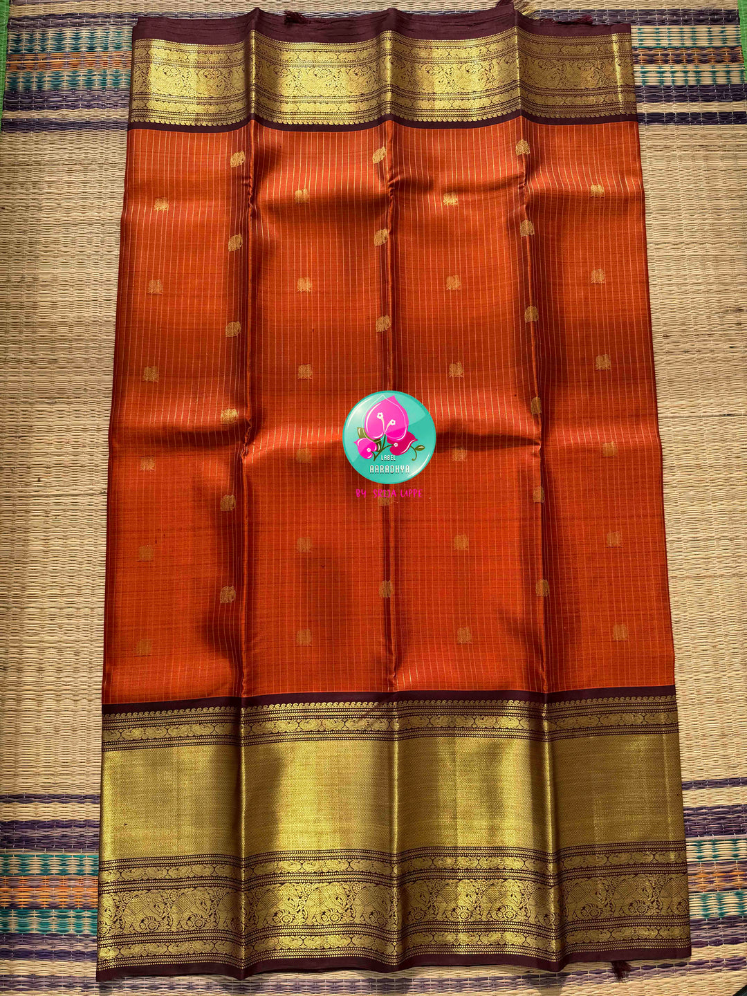 Vintage Earth & Gold: The Rust Orange Vaira Oosi Kanchipuram & Grand Artisan Borders